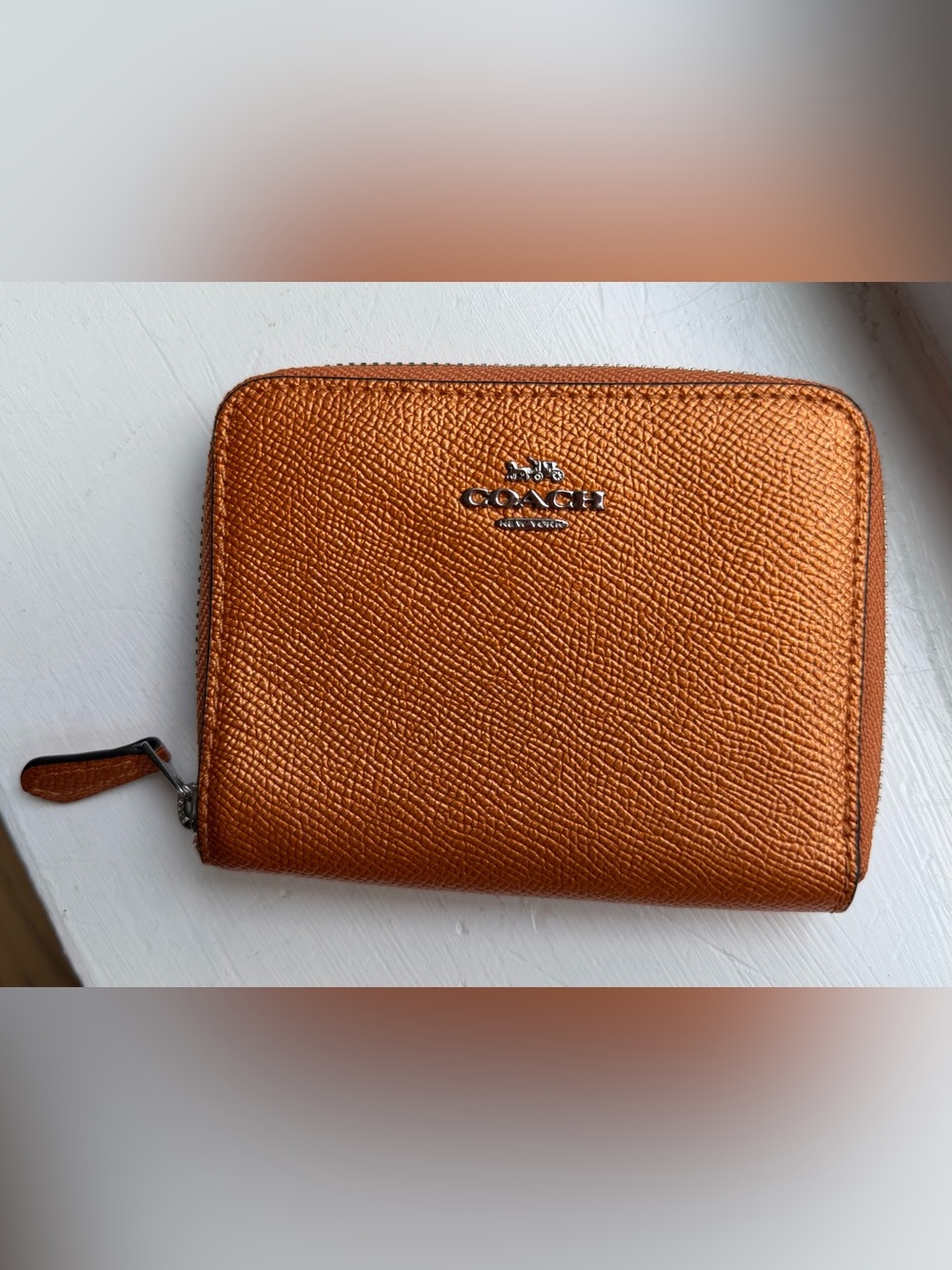 Coach Pebbled Leather Zip Wallet in Metallic Orange